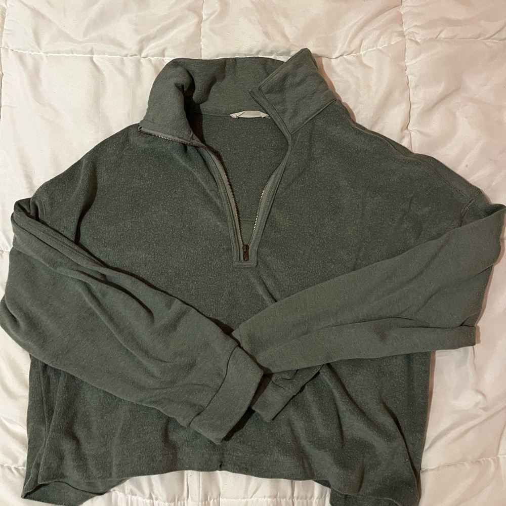 green quarter zip pull over
